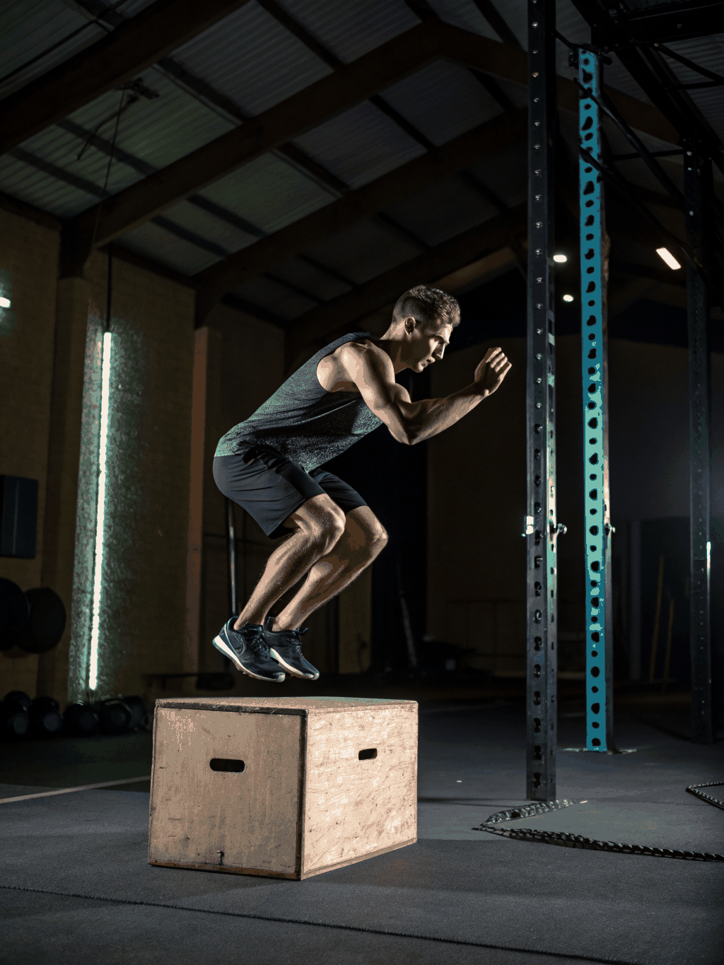 Athlete performing explosive box jumps